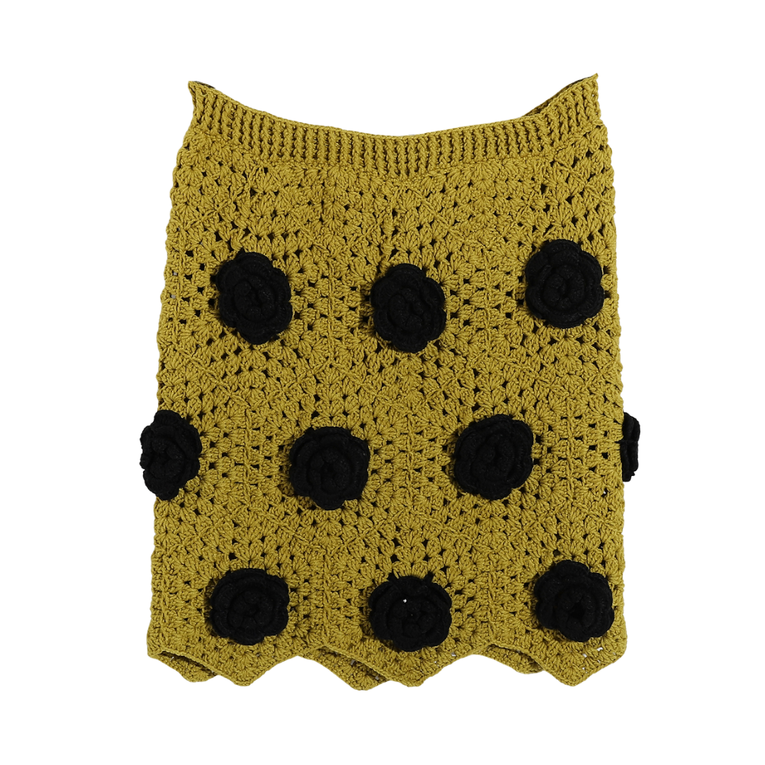 Crochet skirt with black flowers