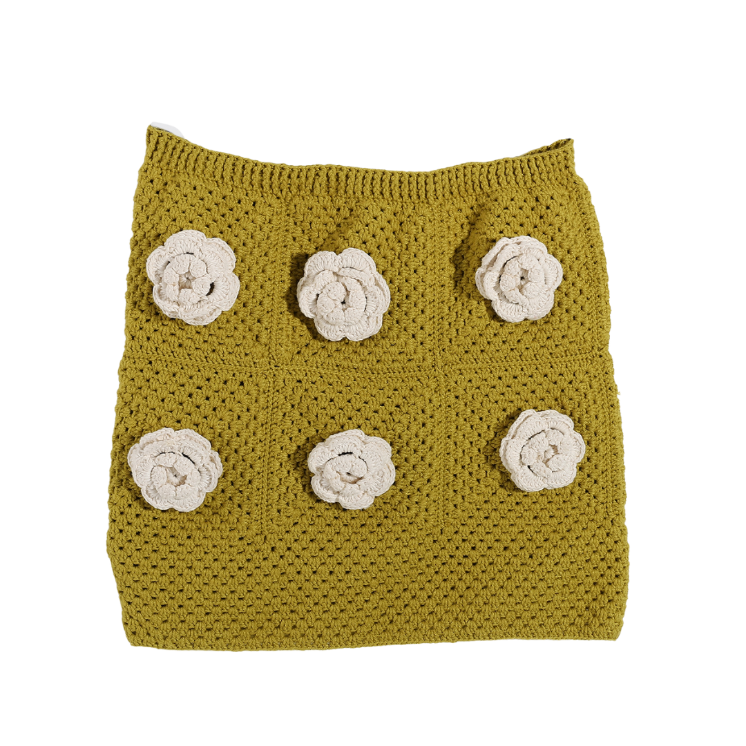 Crochet skirt with floral appliqués
